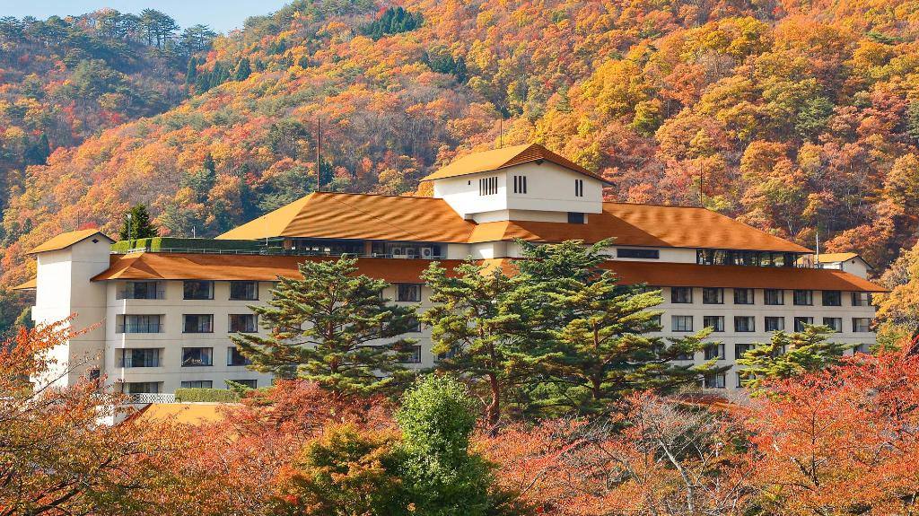 Hotel Koyokan viewed against autumn foliage